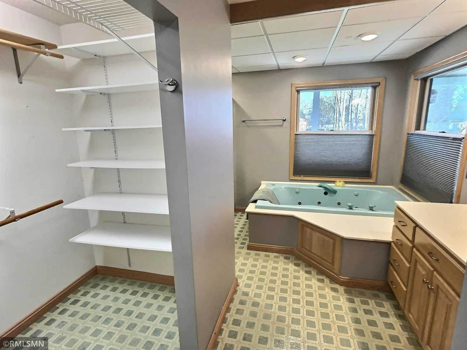 The primary sweet has a large tub and shower with two walk in closets.
