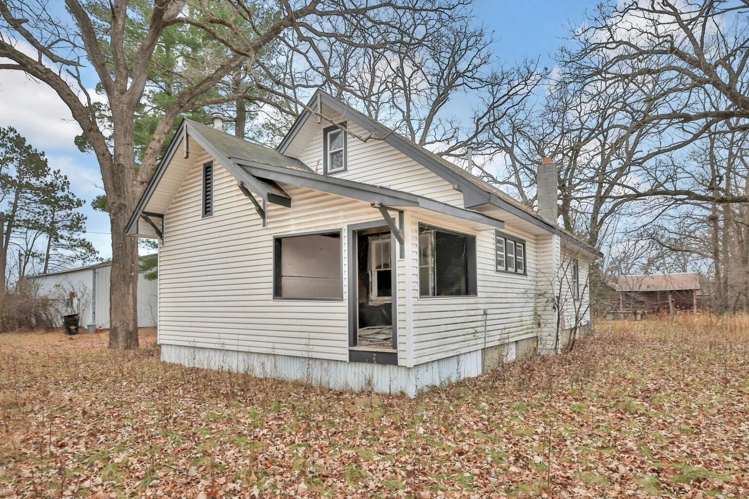 Rear of the house with corner covered porch.