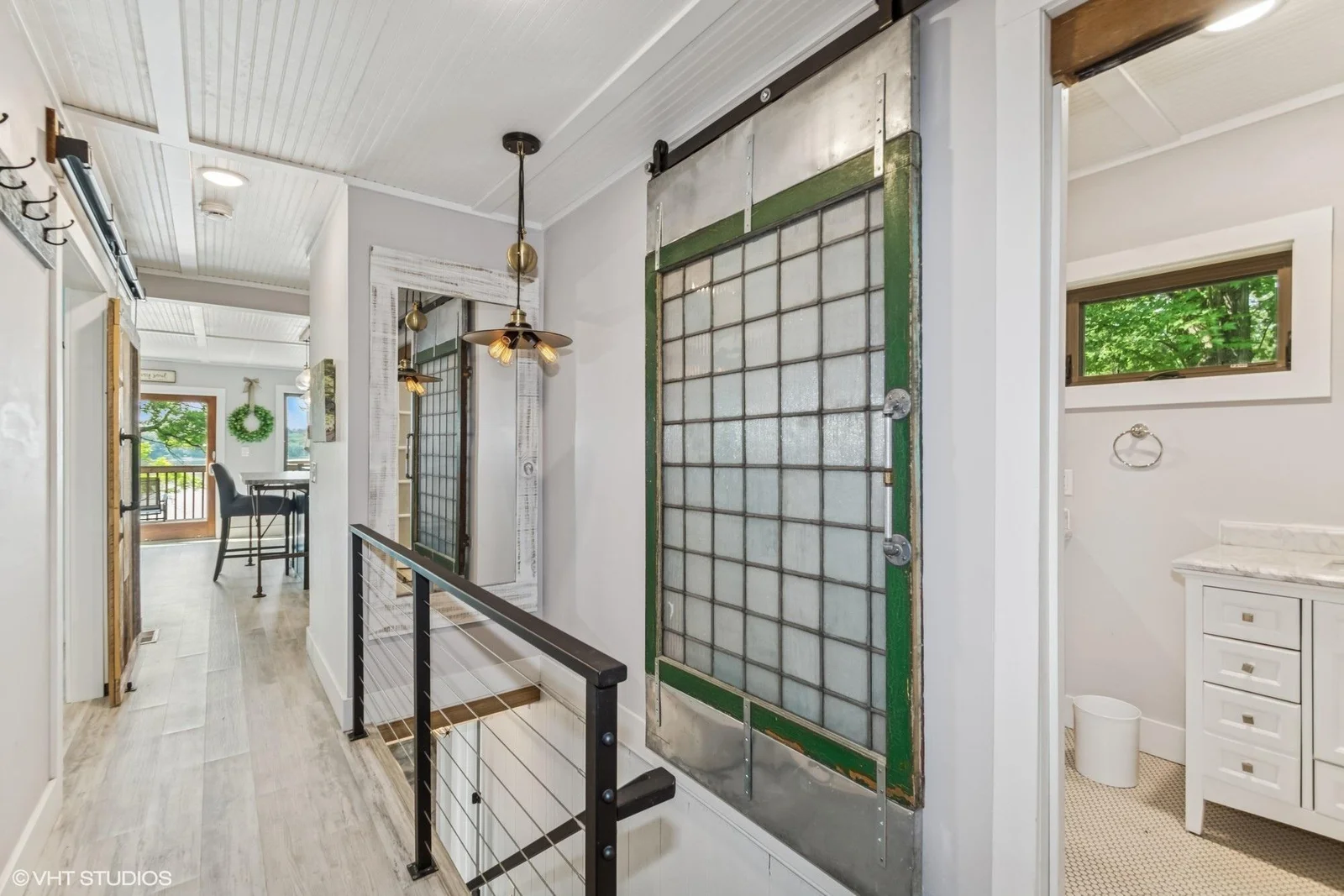 Great custom features with custom barn doors and metal rails