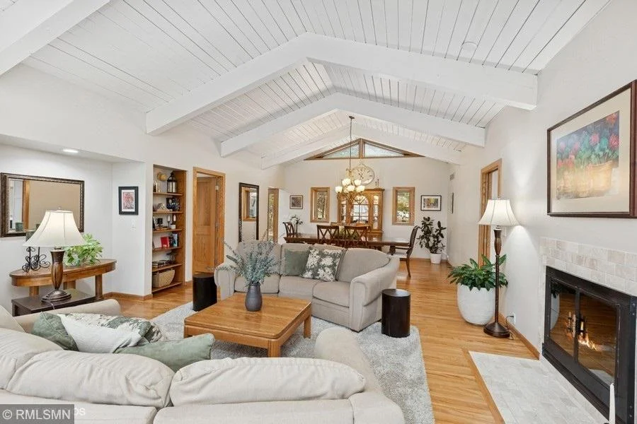 Beautiful wood vaulted ceiling in the dining room and living room.