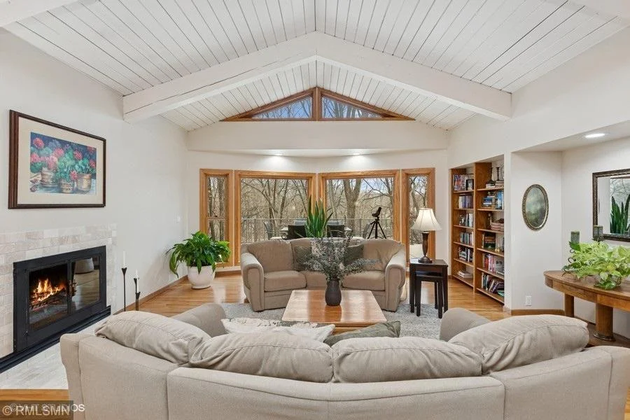 Living room has built in book shelf