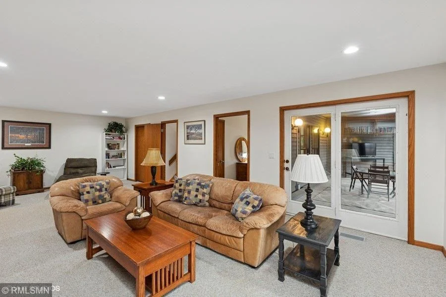 Lower level rec room has a patio door that leads to an amazing 3 season porch!