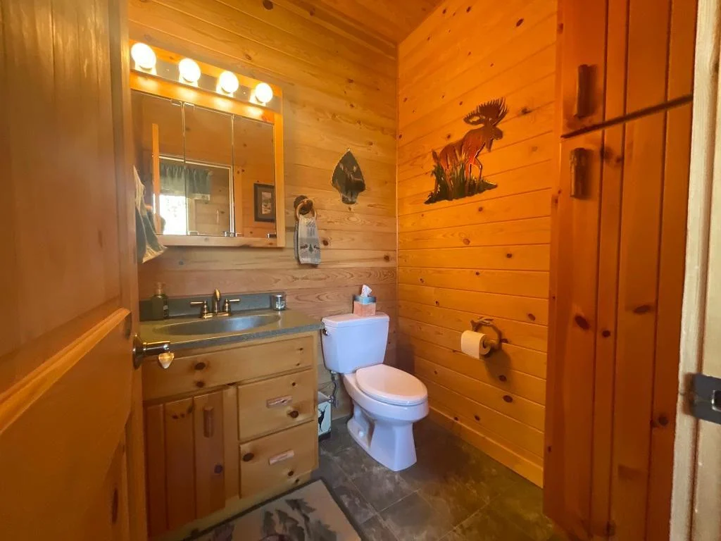 Extra 1/2 bath on main level.