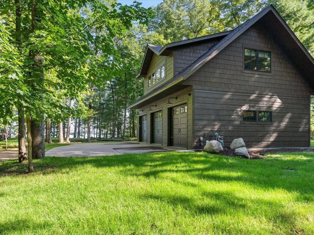 Detached finished garage with living space above!