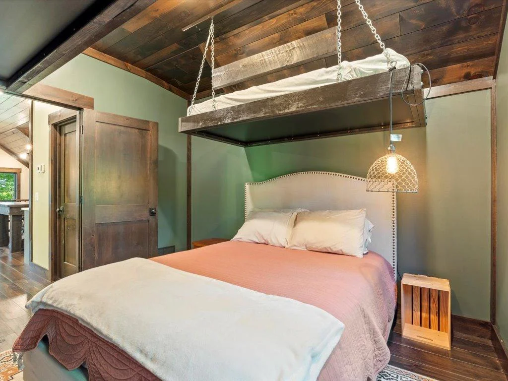 Love the elevated bunks for extra sleeping space.