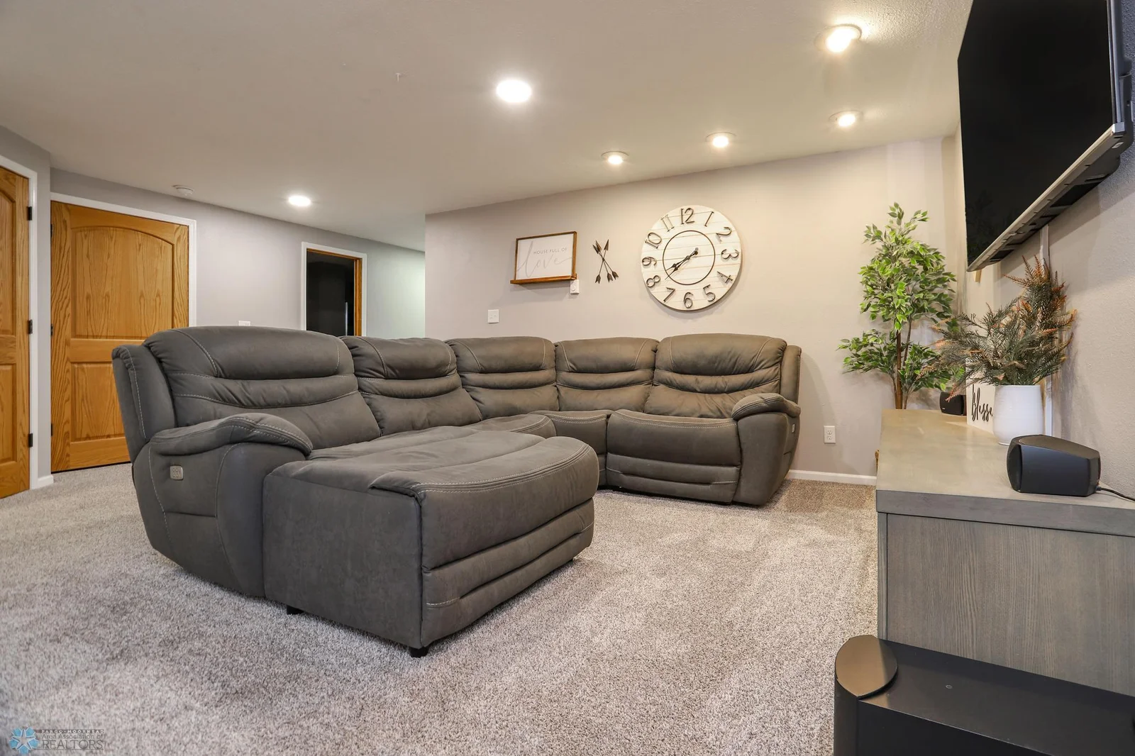 Basement family room with recessed lighting