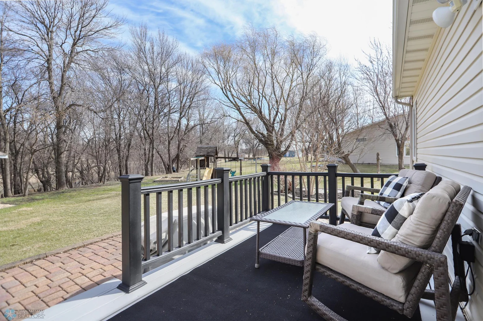 Backyard deck off main floor dining