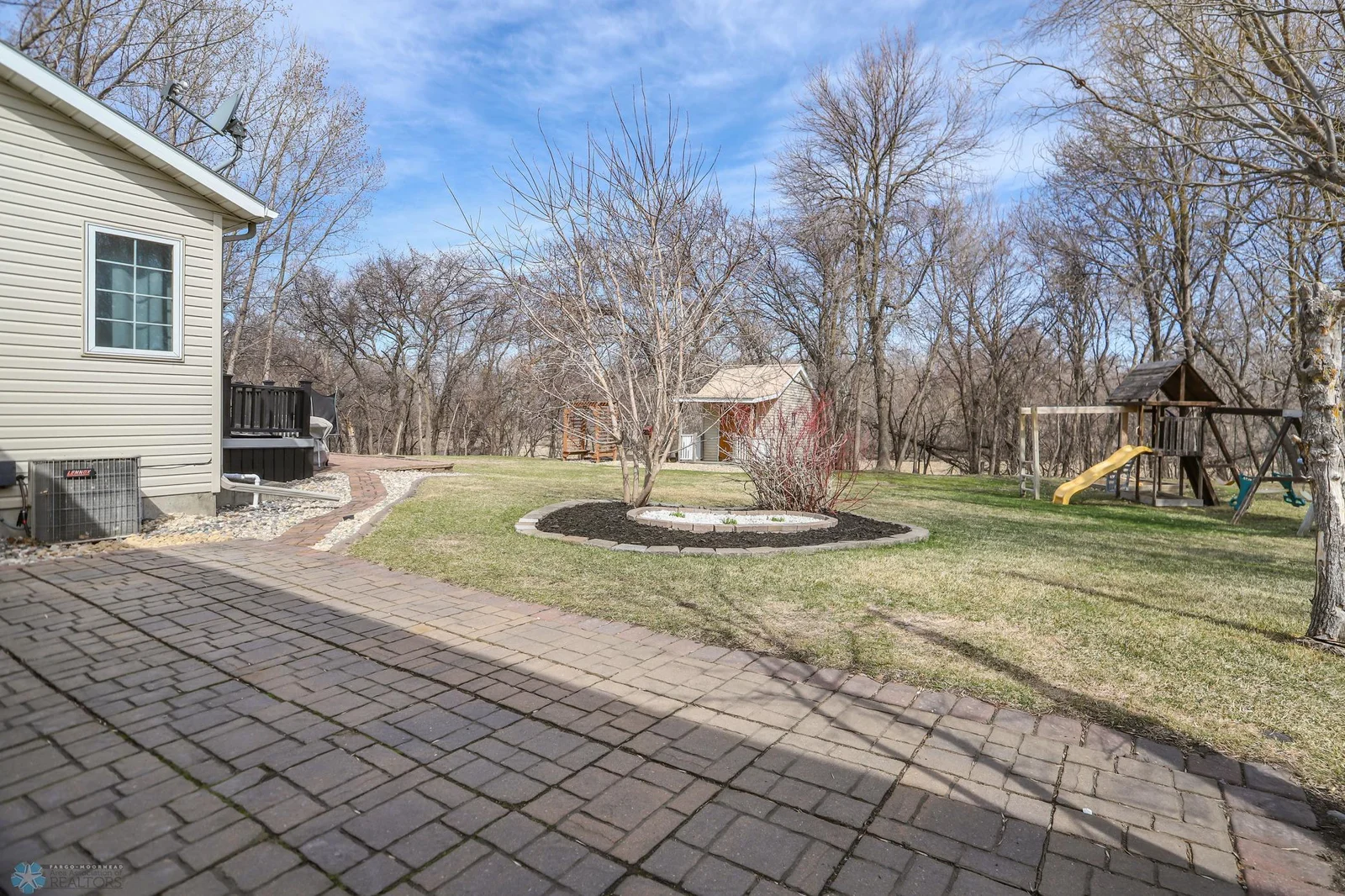 Backyard patio outside rear garage door
