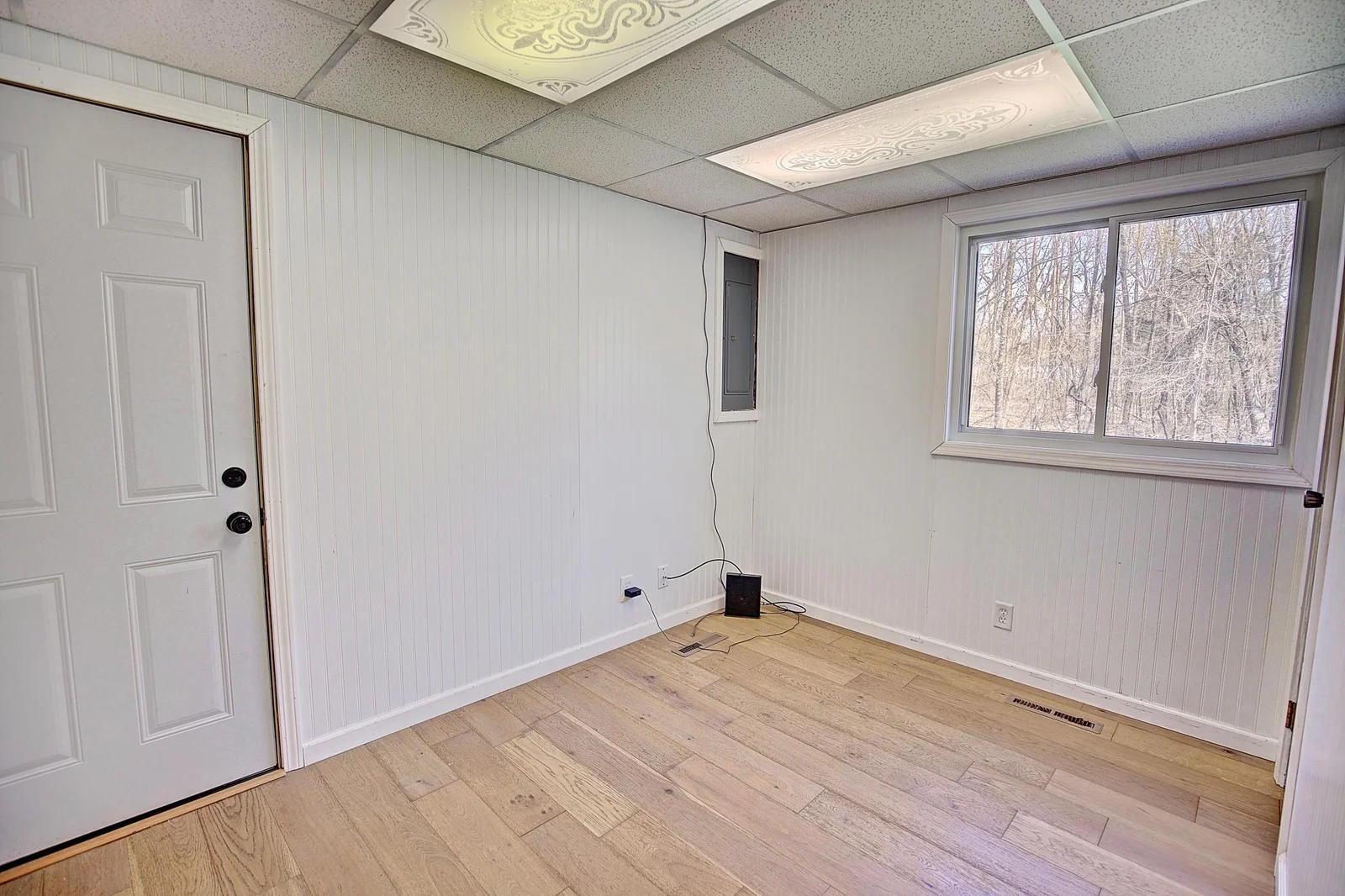 Office off of the garage can flex as a drop zone to hobby area!