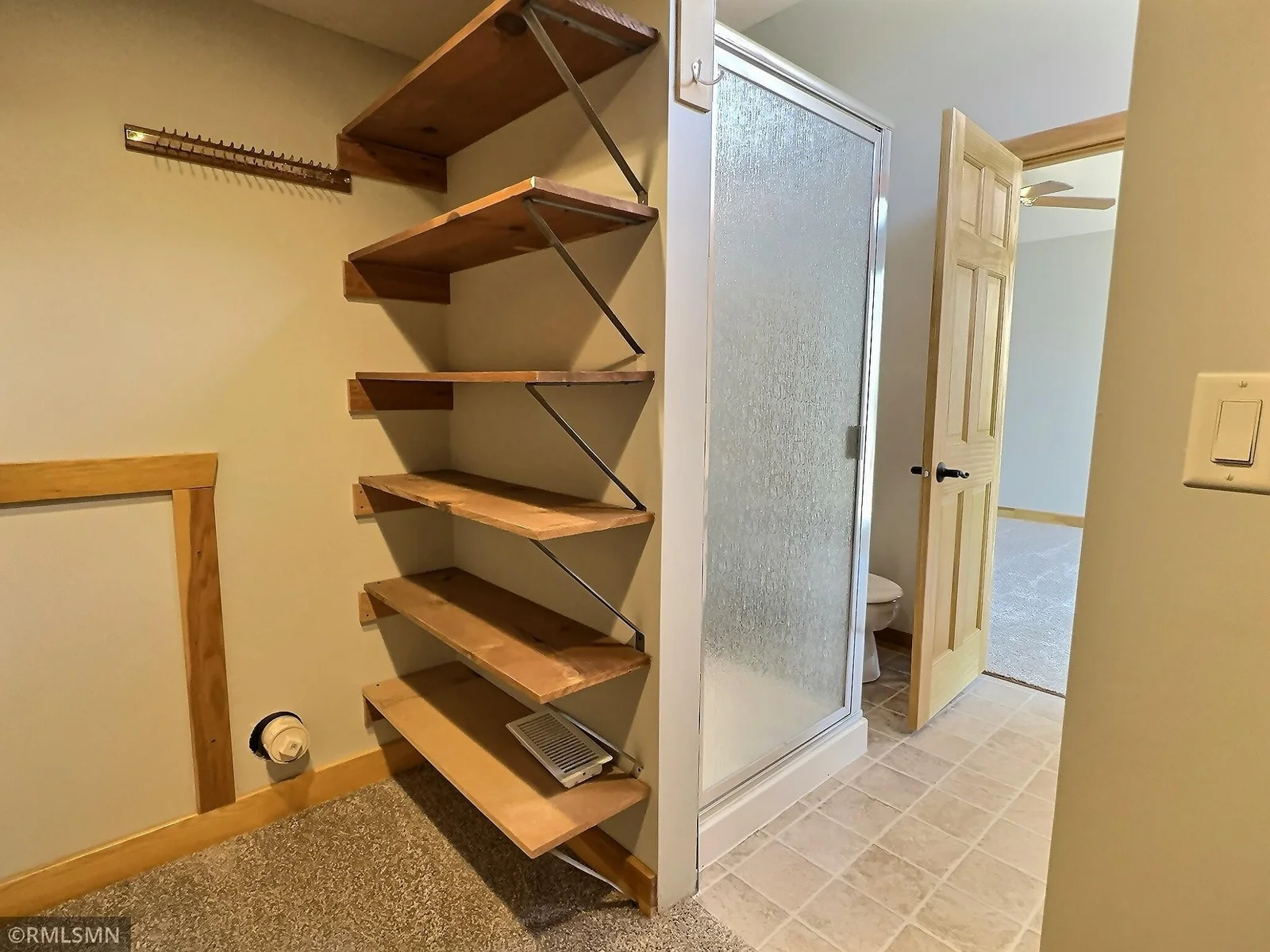 From the en-suite bathroom, enjoy direct access to the spacious walk-in closet.
