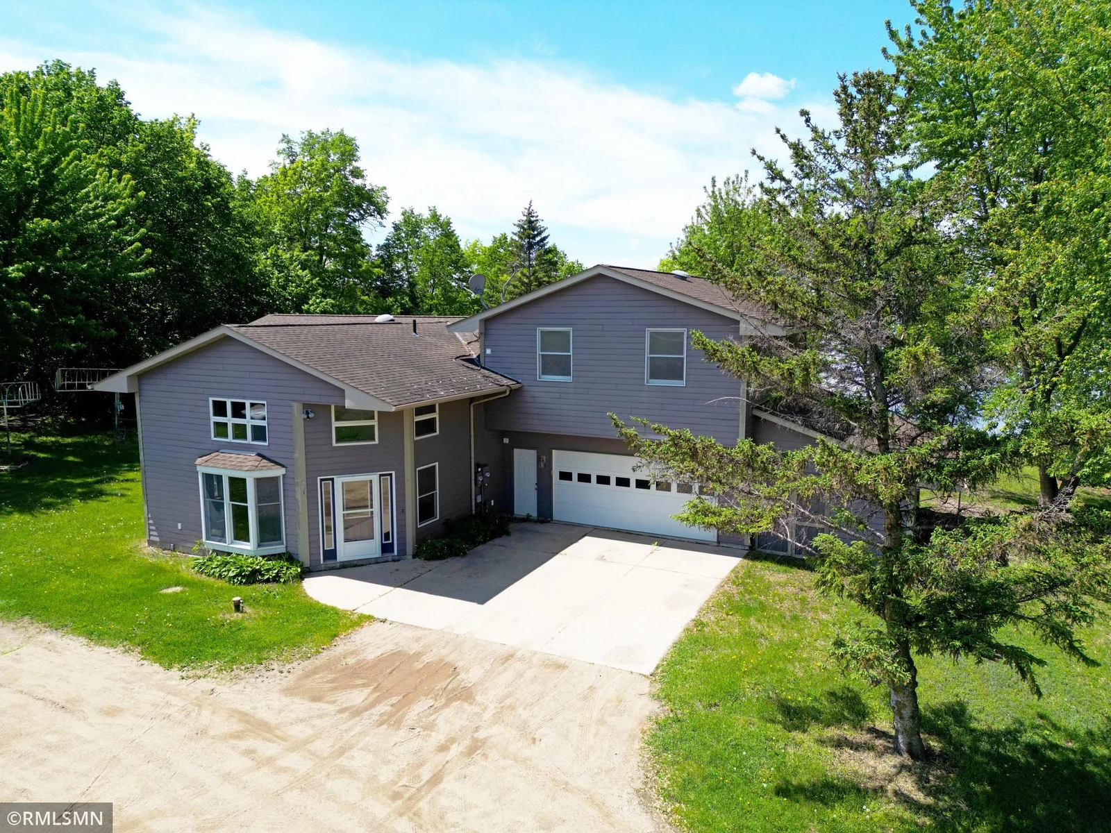 Welcome to 7861 Greer Avenue NW on the shores of Somers Lake.