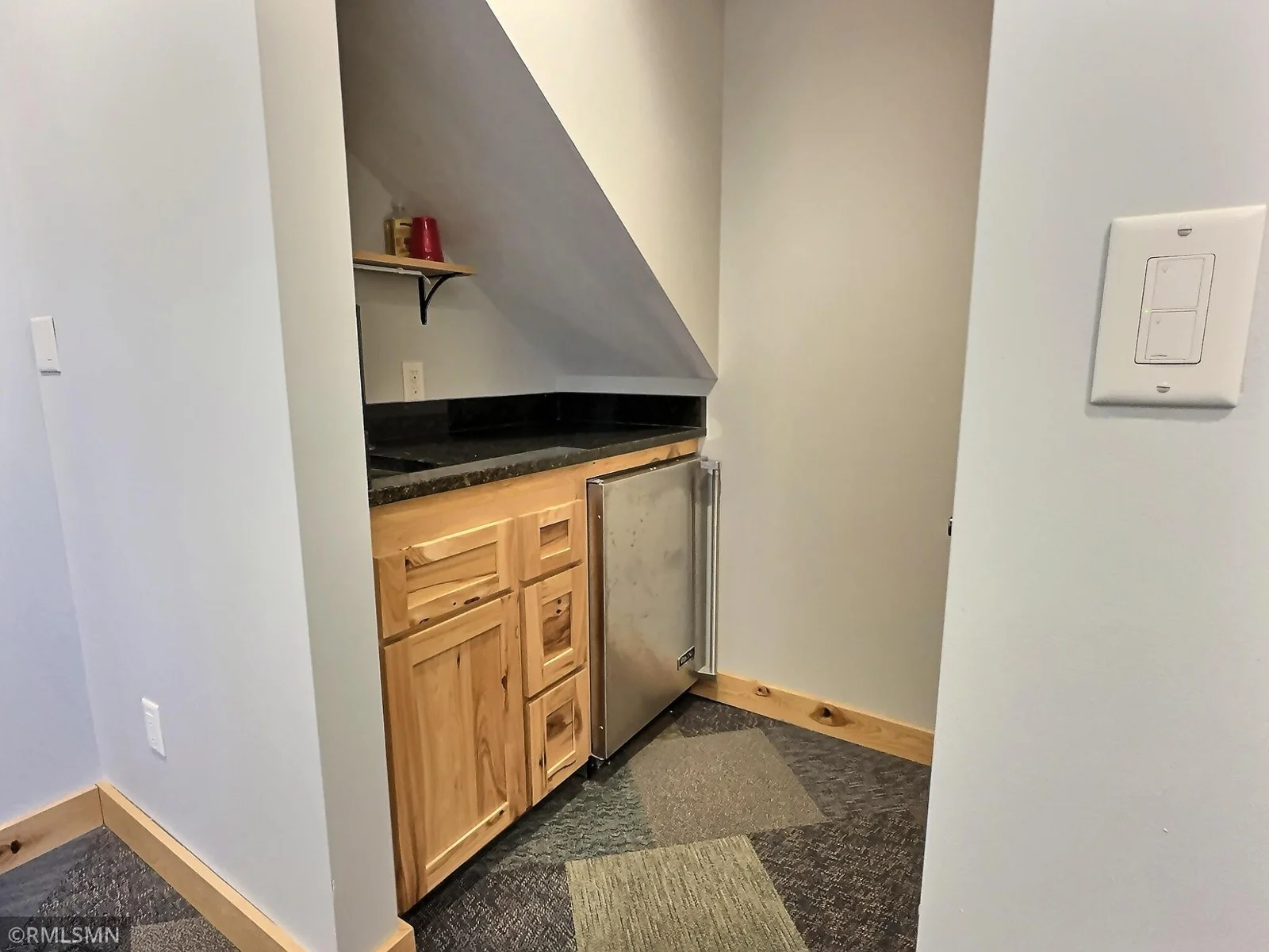 Wet bar area, complete with kegerator.