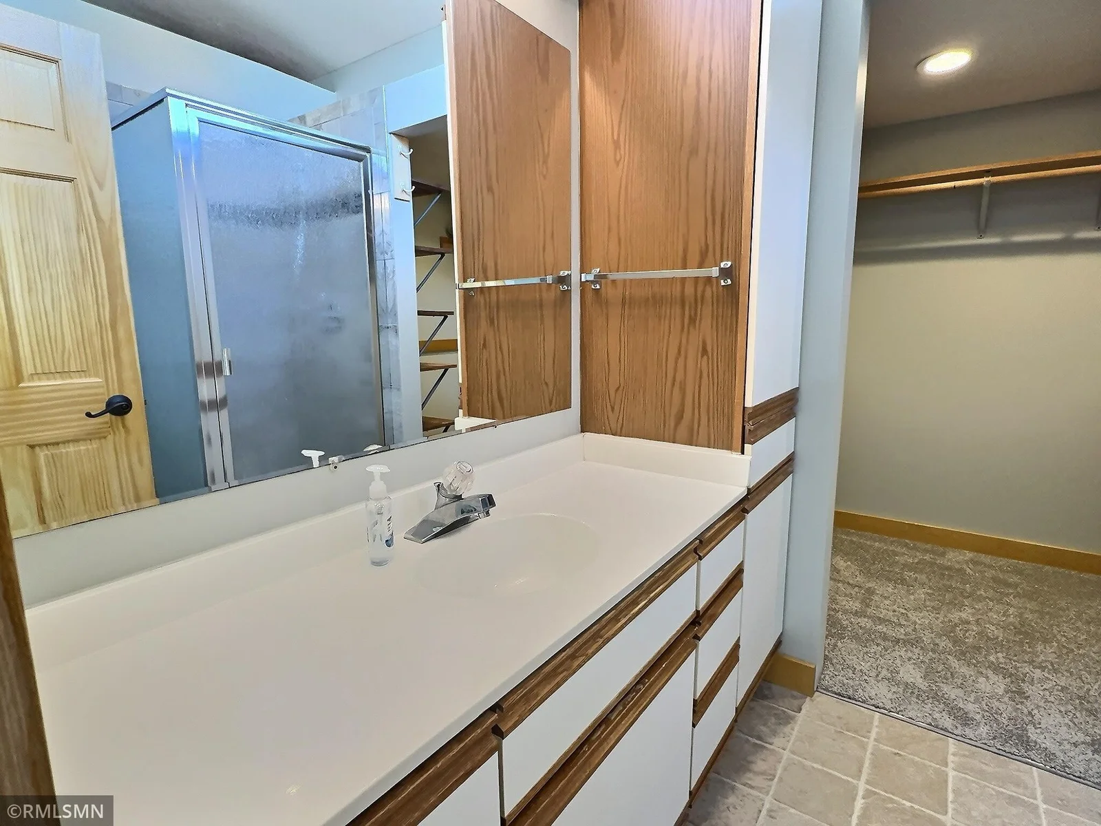 The primary suite includes a full en-suite bathroom