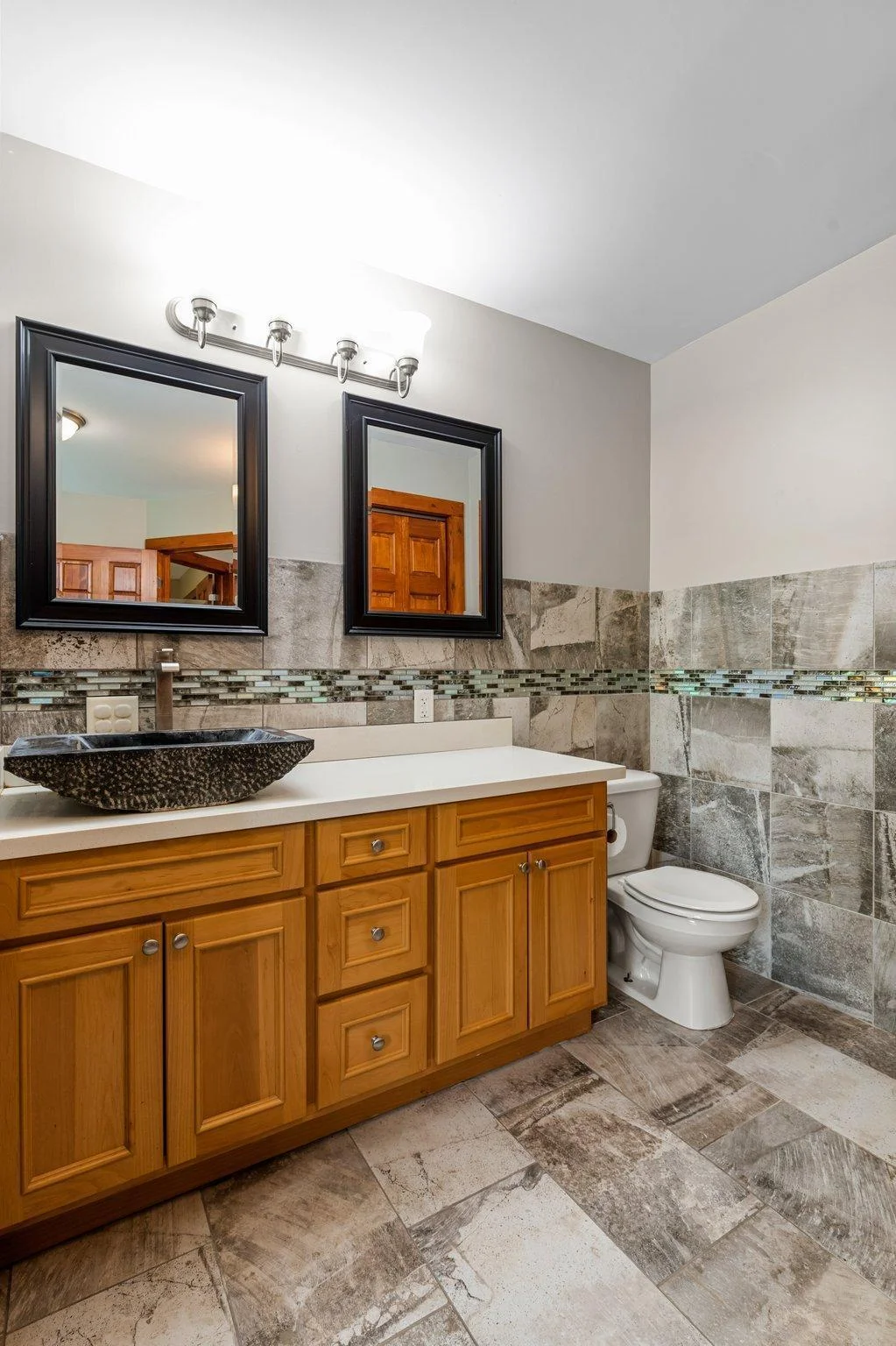 This home includes a gorgeous full bathroom on the upper level.