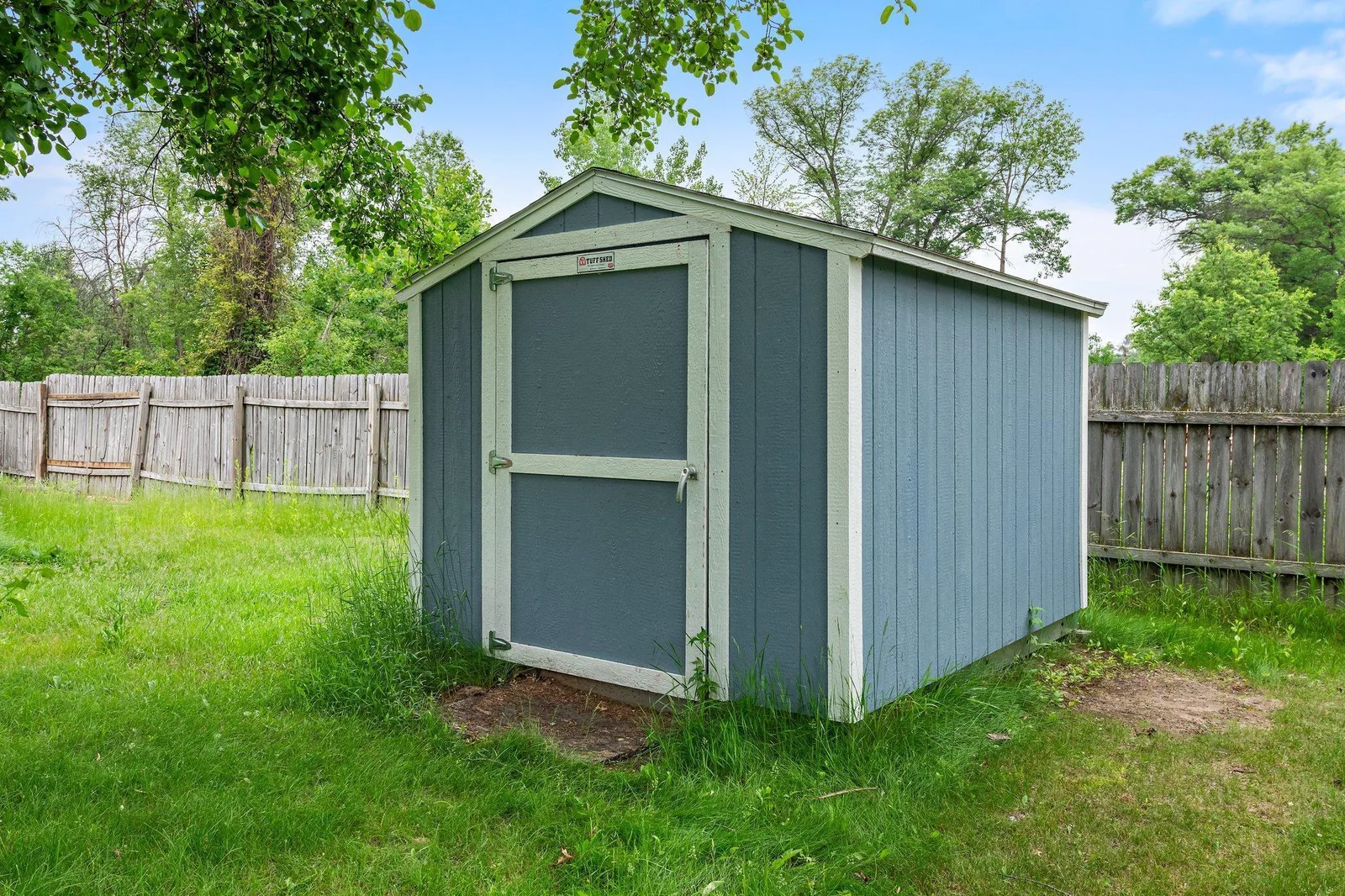 This property includes a shed for extra storage.