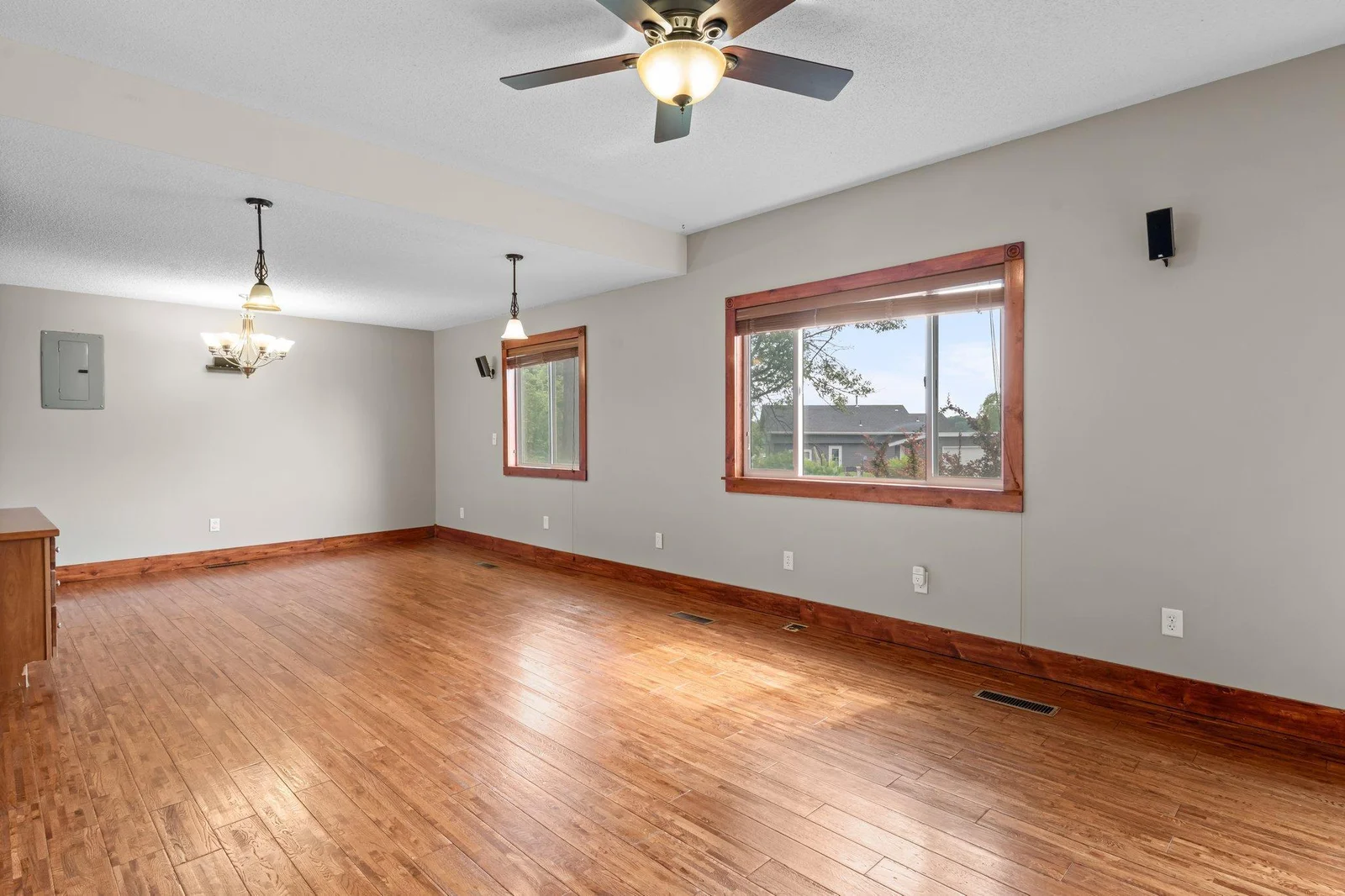 The main floor includes beautiful hardwood floors and gorgeous wooden trim and paneled doors.