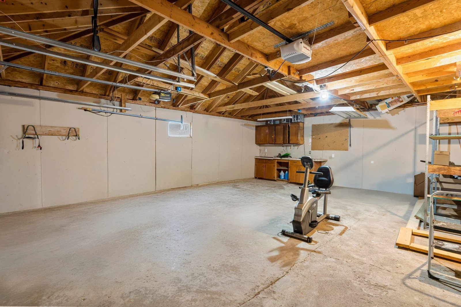 The two-car garage has been sheetrocked.