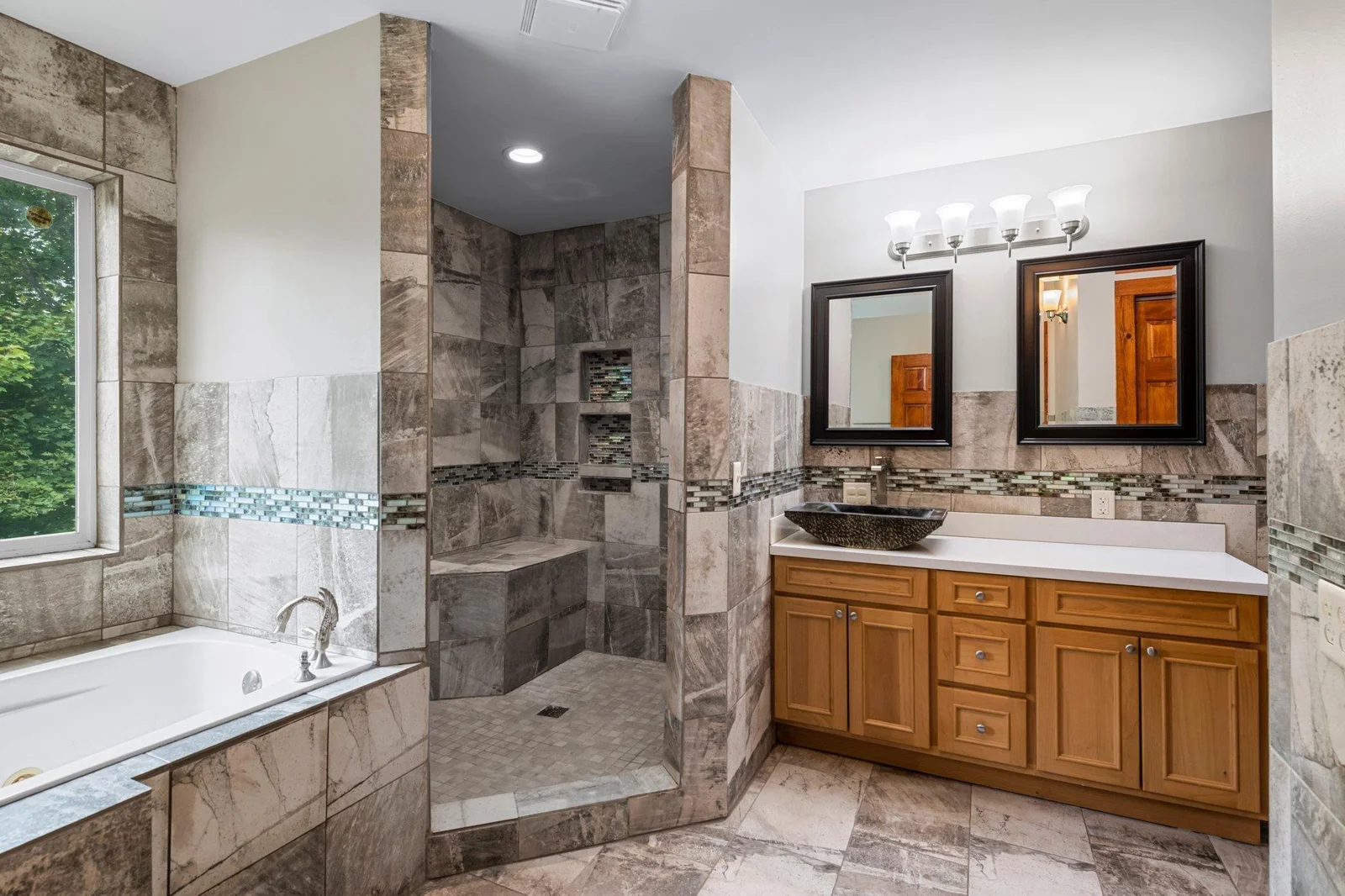 This home includes a gorgeous full bathroom on the upper level.