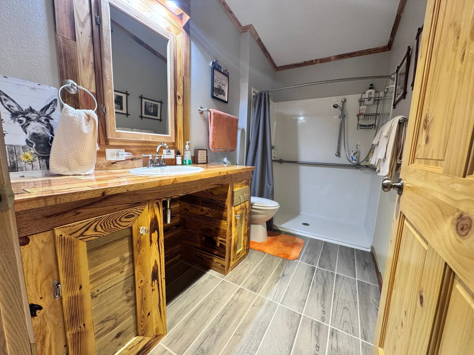 Guest Bathroom with a oversized walk in shower and custom built vanity