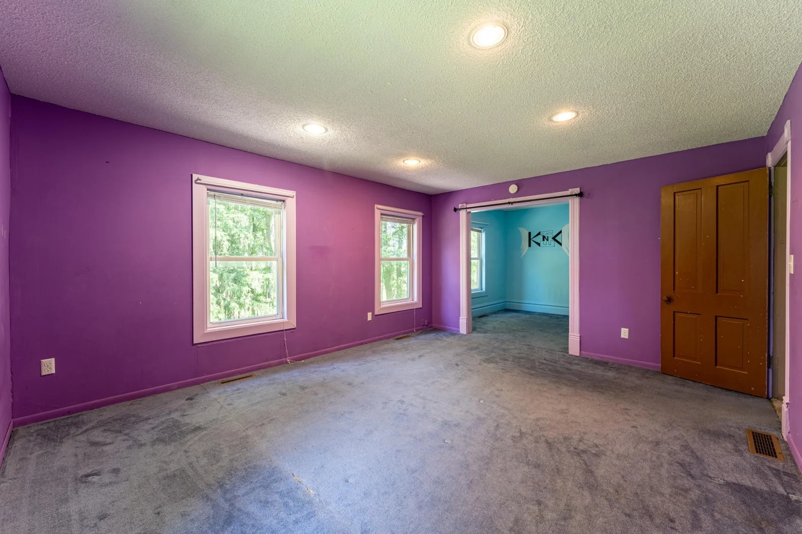This large bedroom is 15.5 x 12.75 ft, plus a 9.5x6 ft room and 5.5 x 5 walk-in closet.