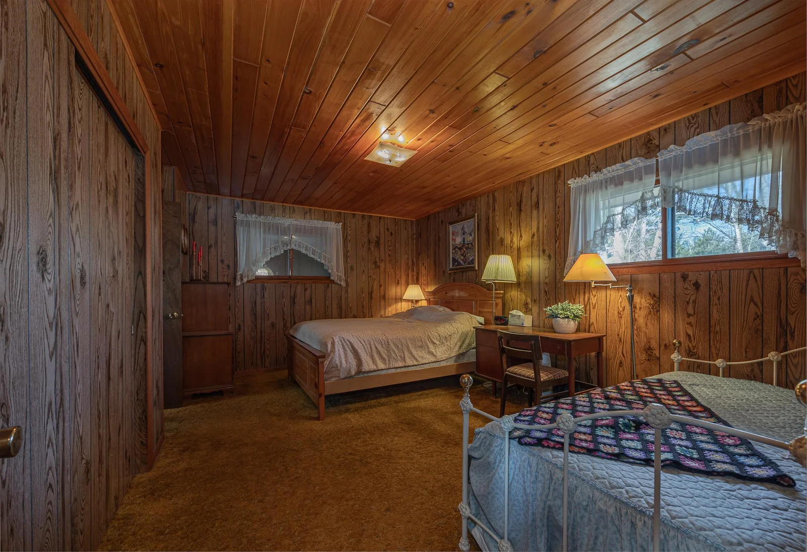 Huge bedroom large enough for multiple beds.