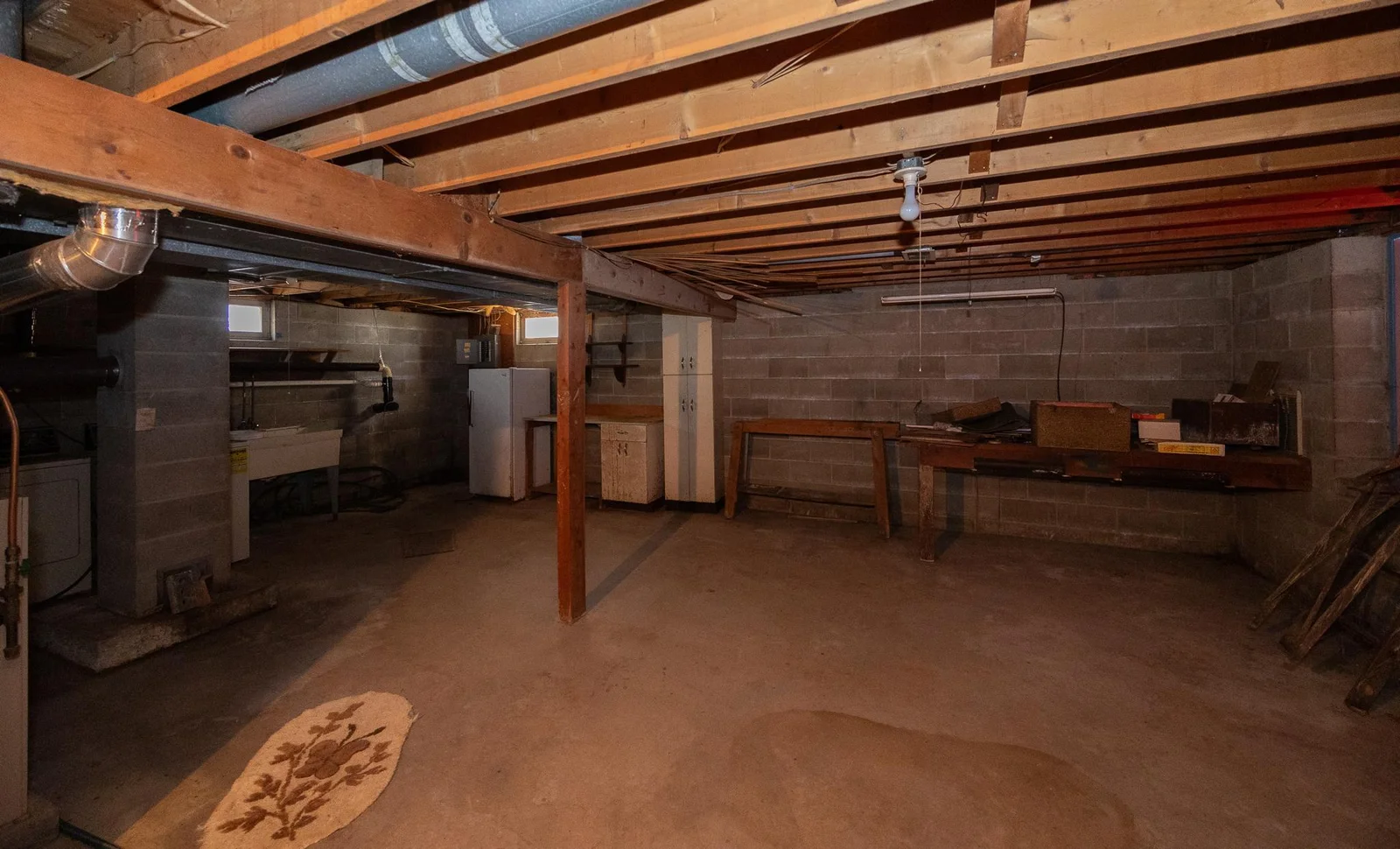 Unfinished basement, north wall is in need of repair.  Selling in present condition.