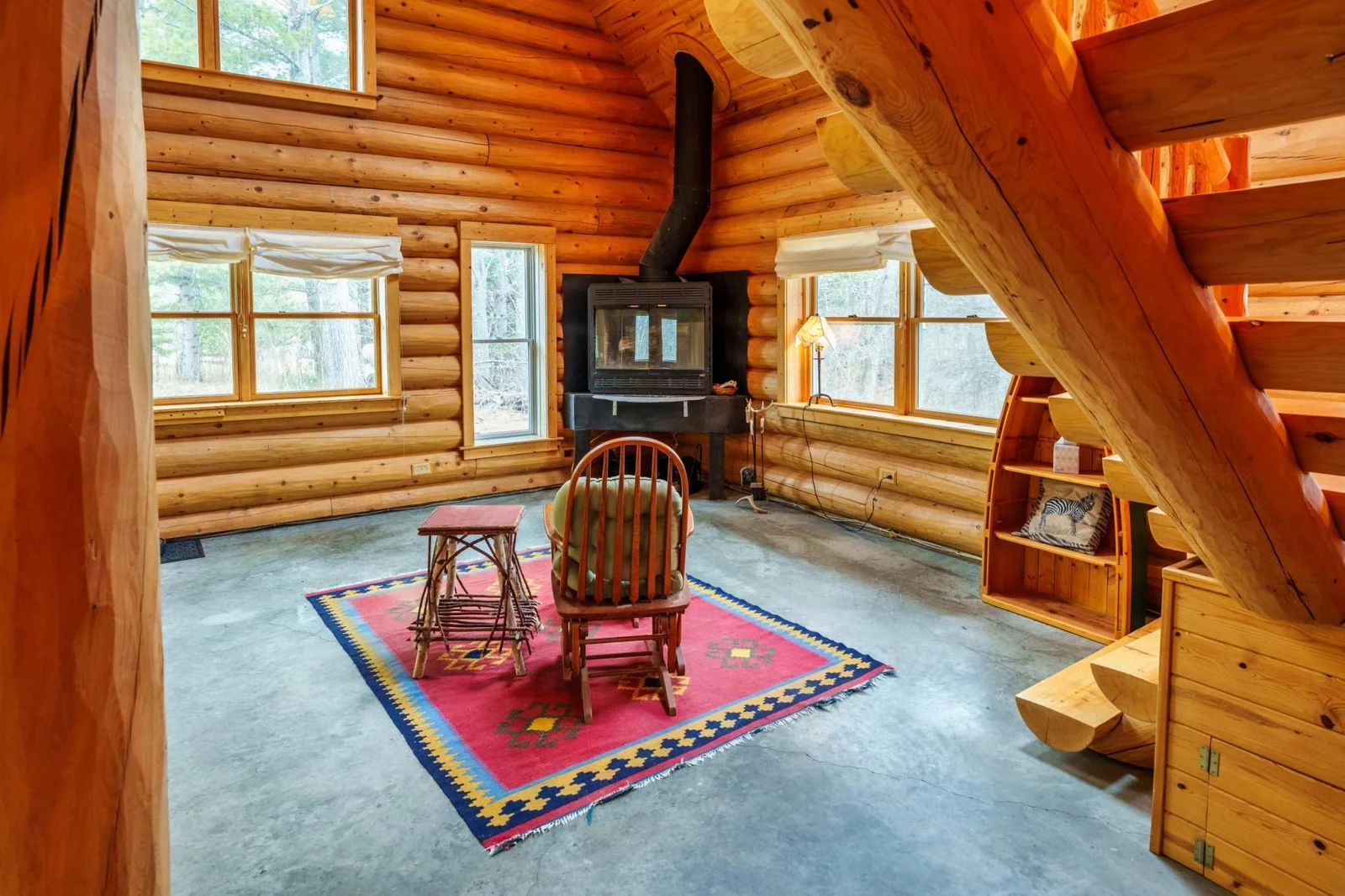 Living Room With Wood Fireplace.jpeg