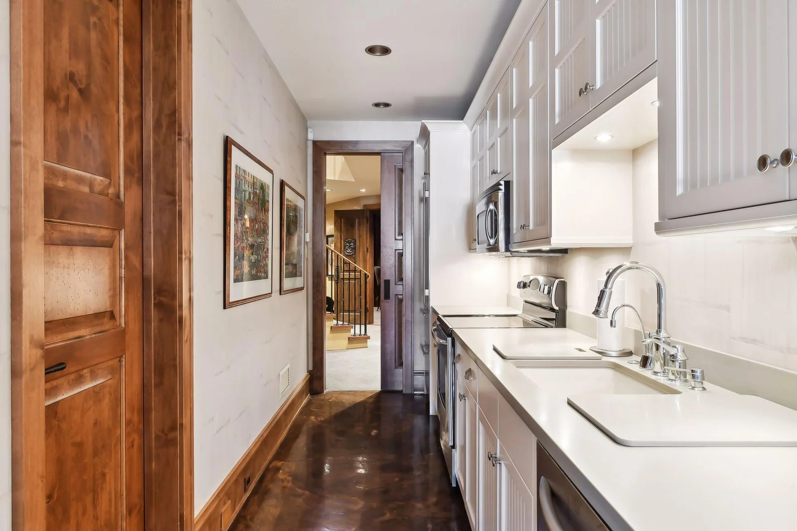 Lower level kitchen galley is located just off from the bedrooms, making it easy to grab a coffee first thing in the morning