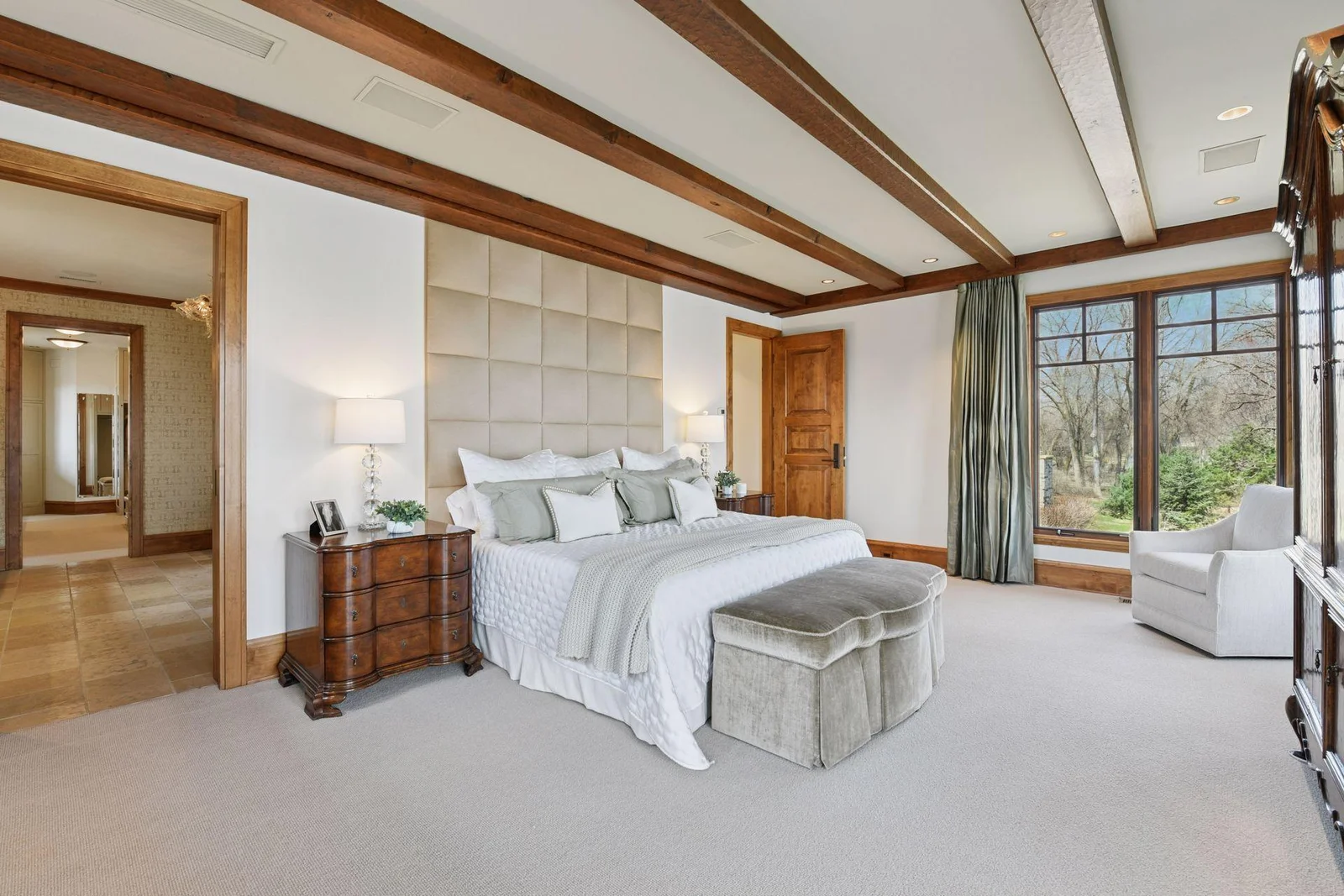 Wood-beamed ceilings, beautiful natural light, and sunrise views over the lake