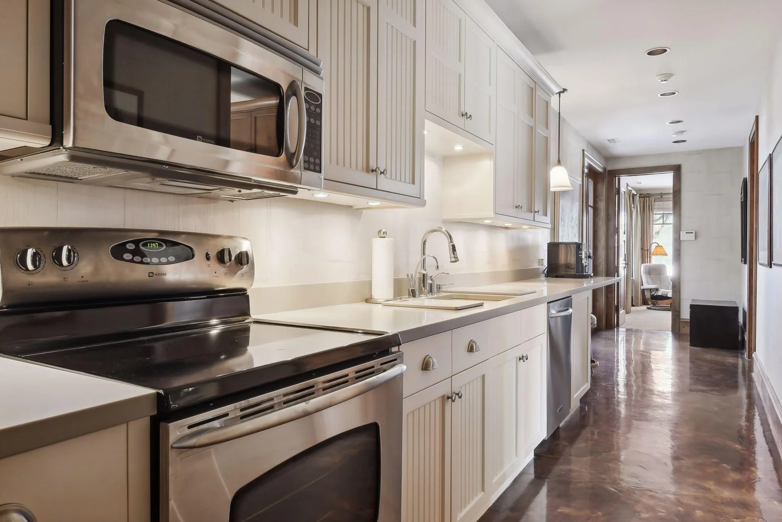 Lower level full kitchen comes in handy when entertaining on this level