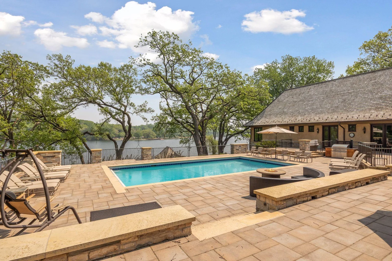 Enjoy views of Bryant Lake from the pool deck