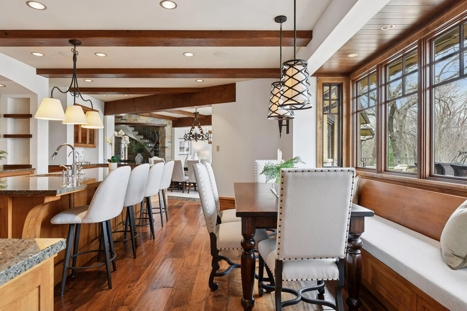 Informal dining area in the kitchen features built-in bench seating