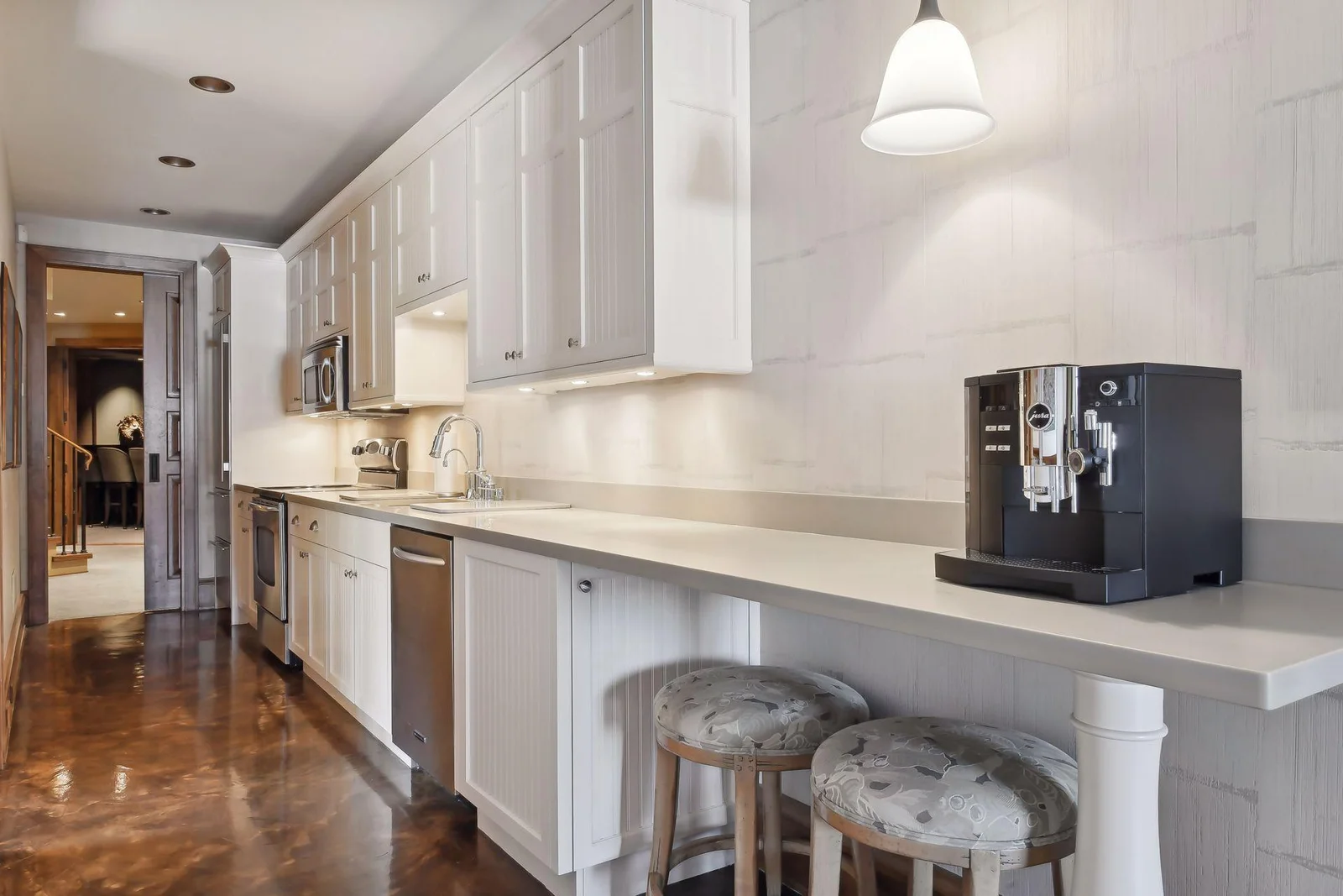 A breakfast bar makes it easy to grab a quick bite before heading upstairs to start the day