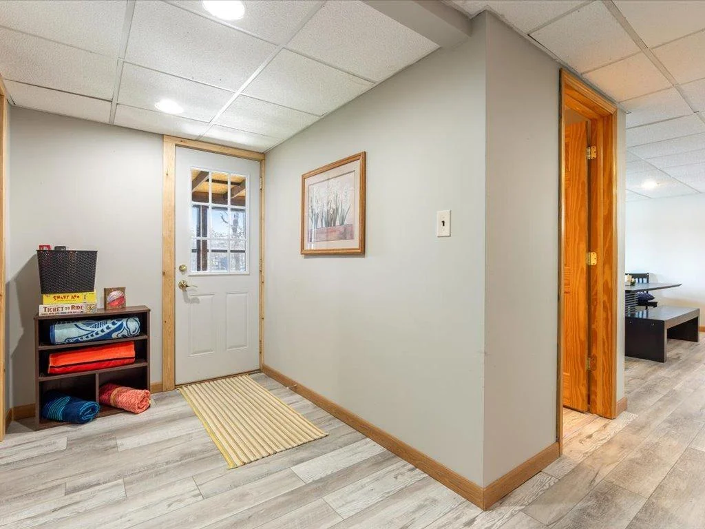 Lower foyer to walkout three season porch