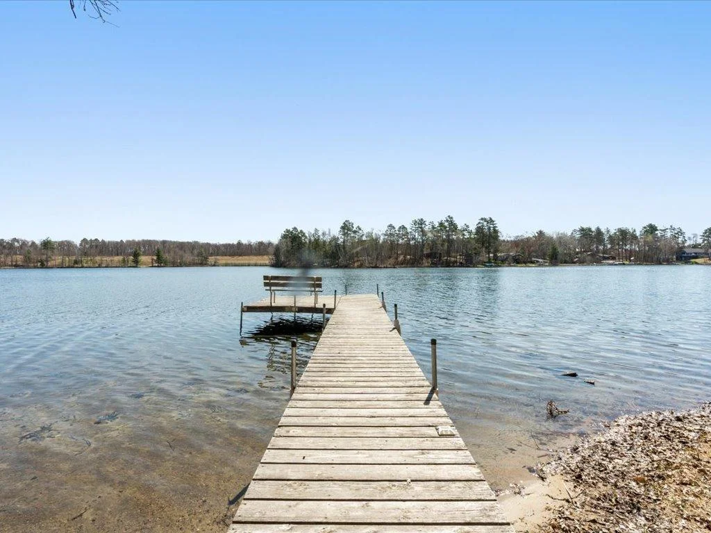 Enjoy the nice sandy beach on West Twin Lake home!