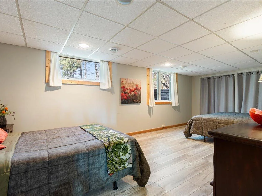 Spacious lower bedroom with two closets