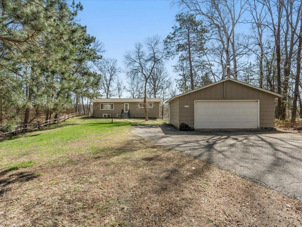 Rare find on West Twin Lake.  Year-round rambler with two-car garage.