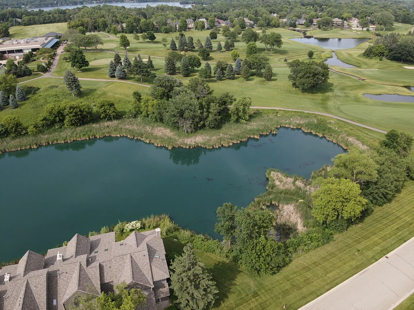 Sweeping pond and golf course views!