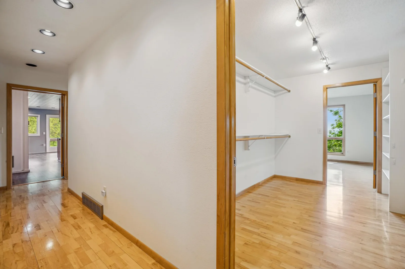 Photo shows one of the large walk-in closets in the master suite.