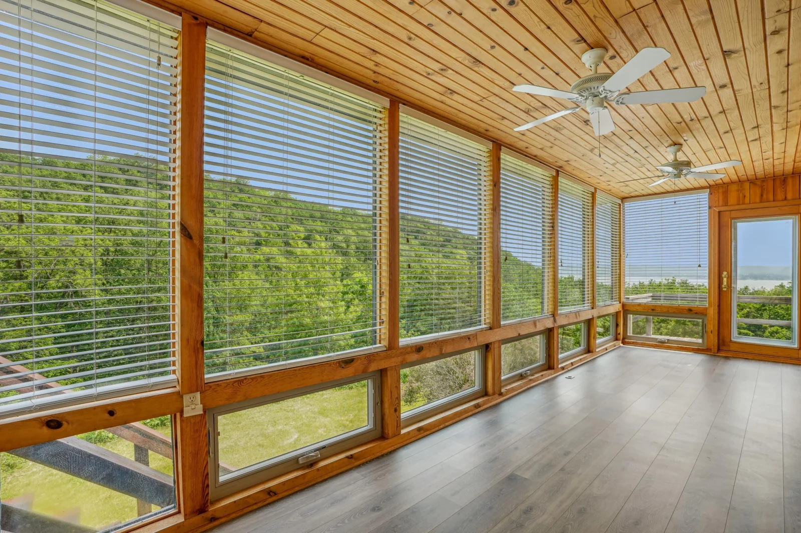 You enter the home through this expansive three season "porch".