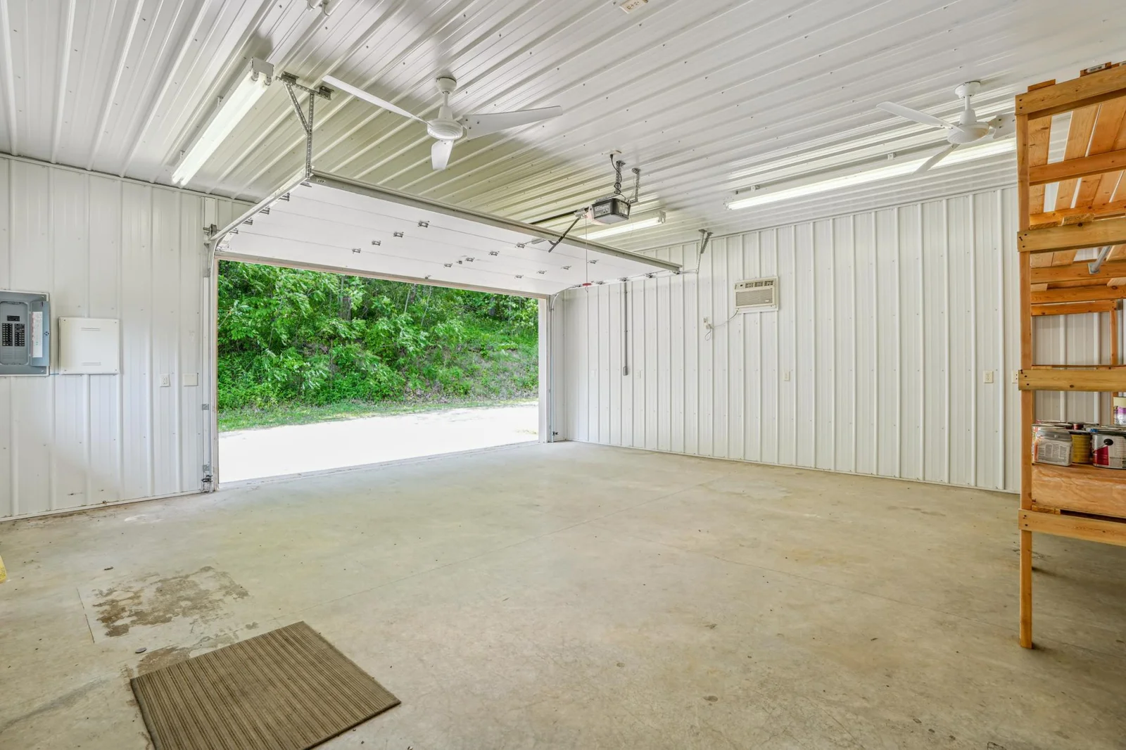 Garage space of detached shop.