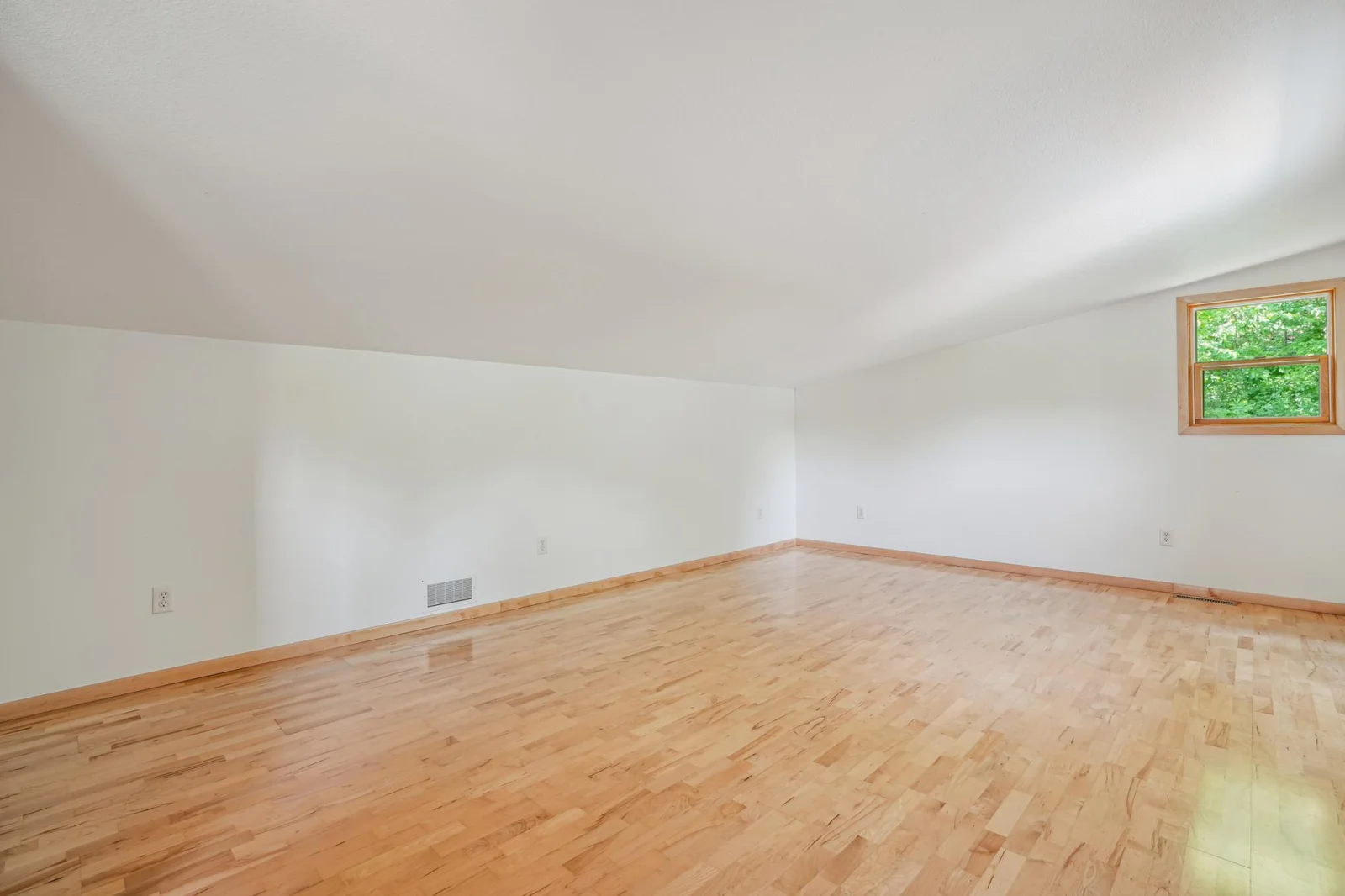 Large upper level family room could also serve as a huge bedroom.