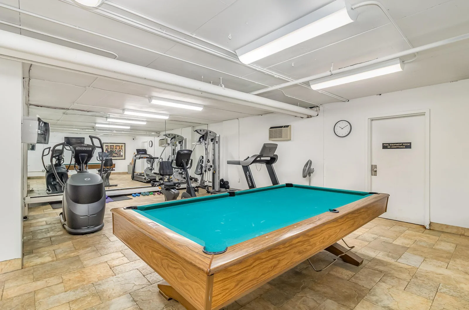 Exercise room and pool table