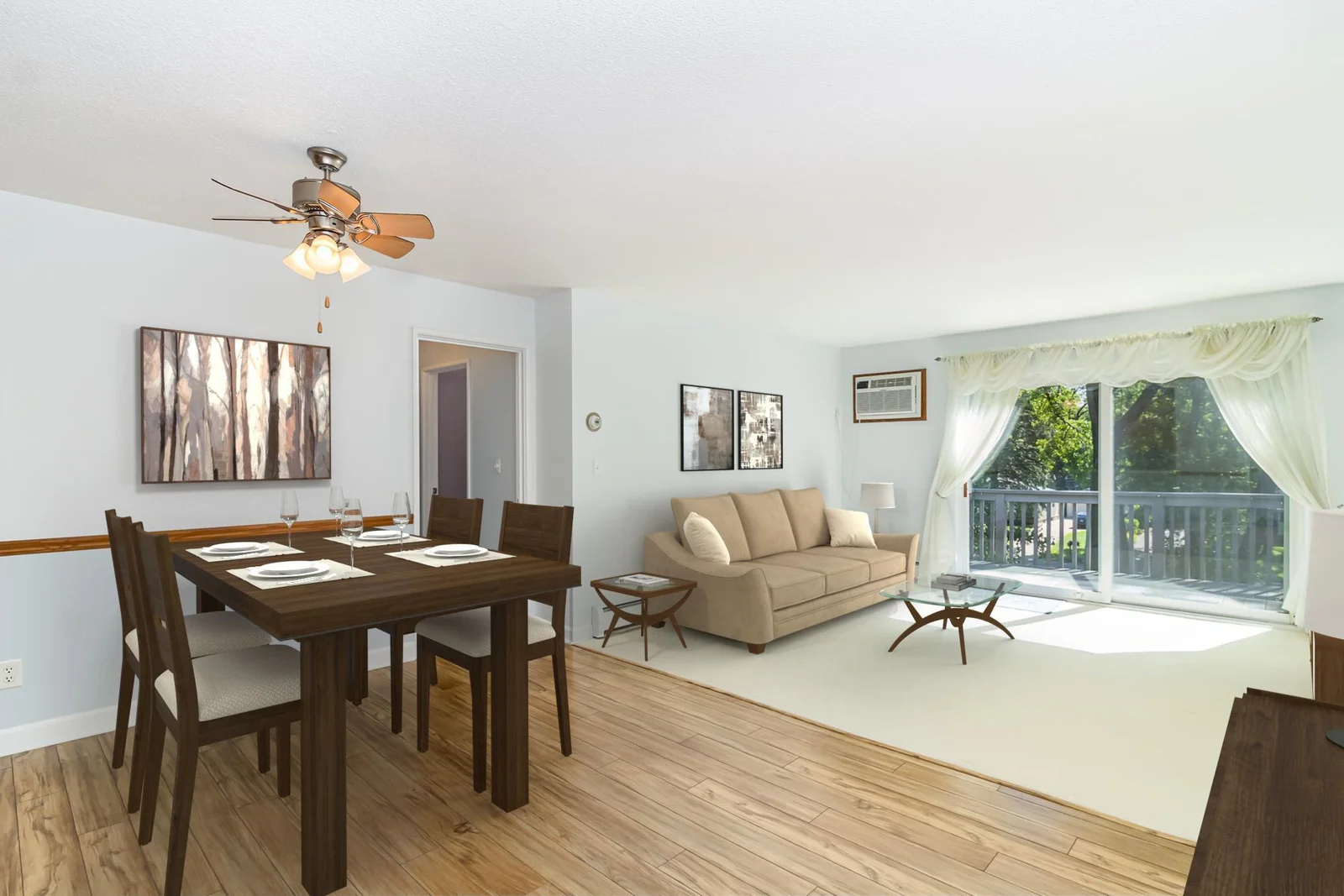 The condo's living room/dining area Virtually Staged