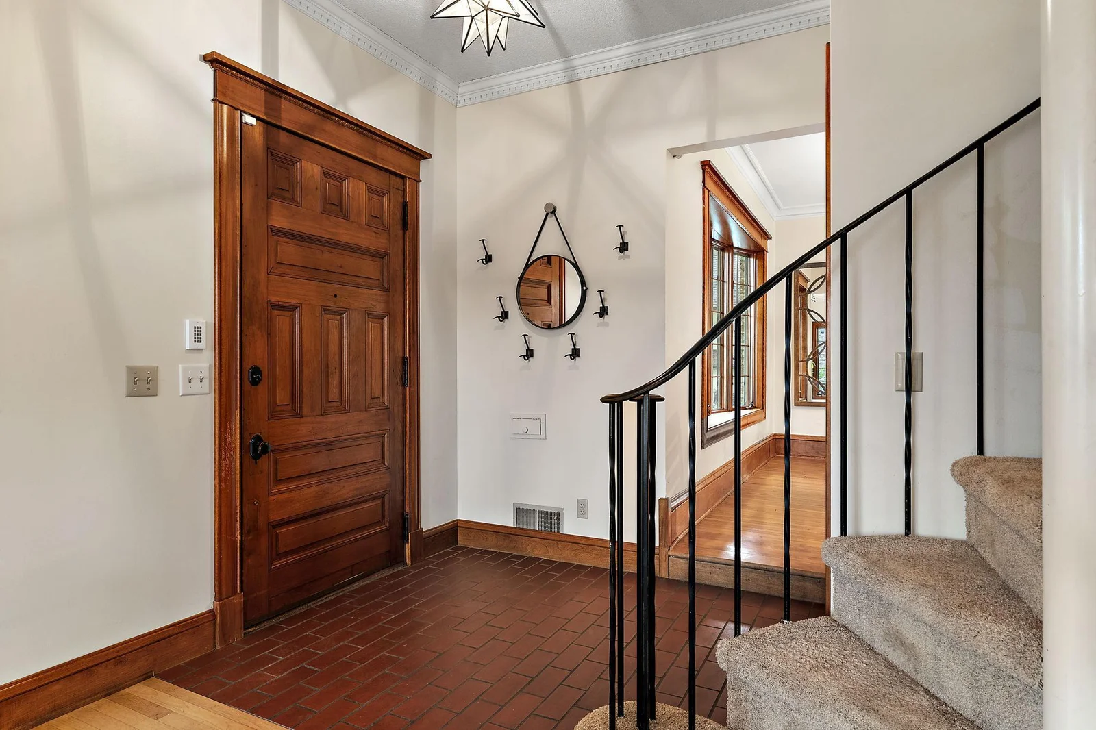Spacious front entry with glazed tile.