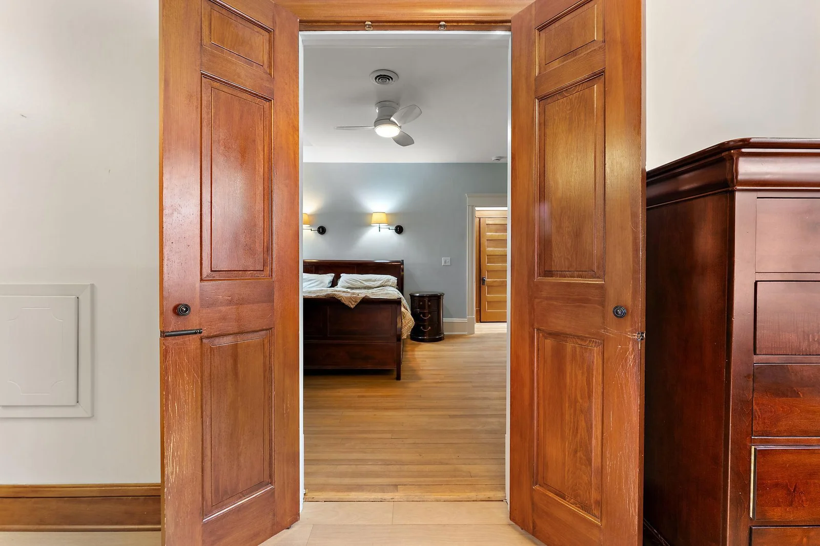 A view from the walk-through closet of primary.