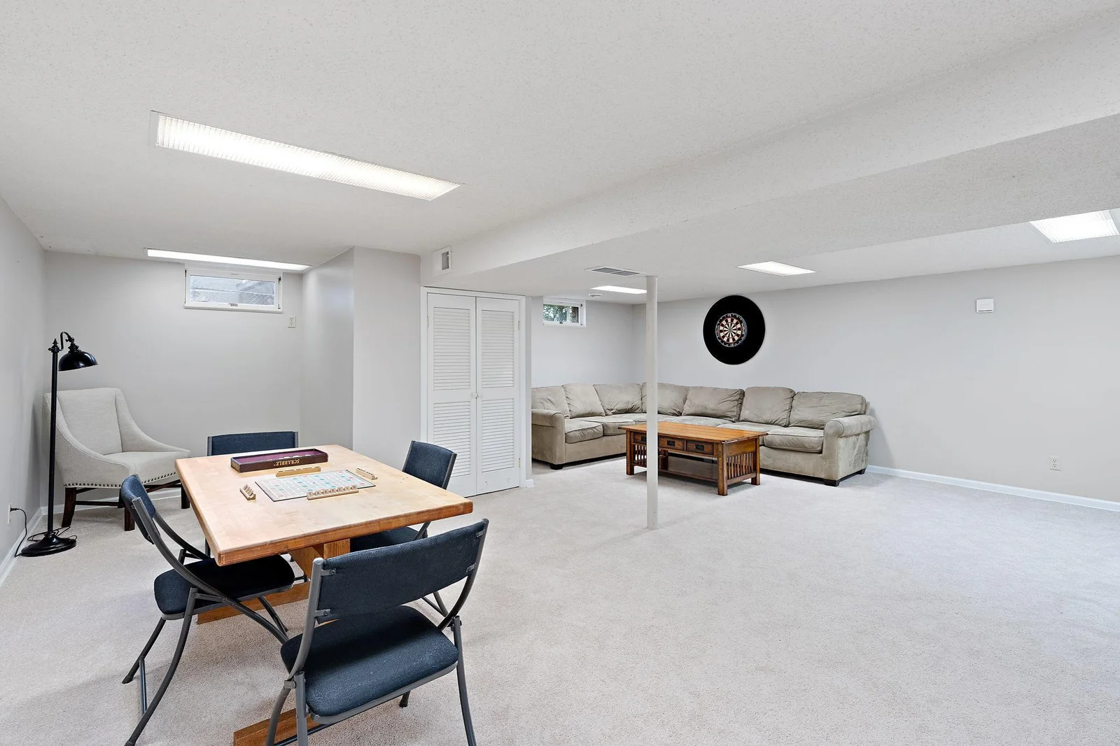Check out this huge lower level family/gaming/theater room!