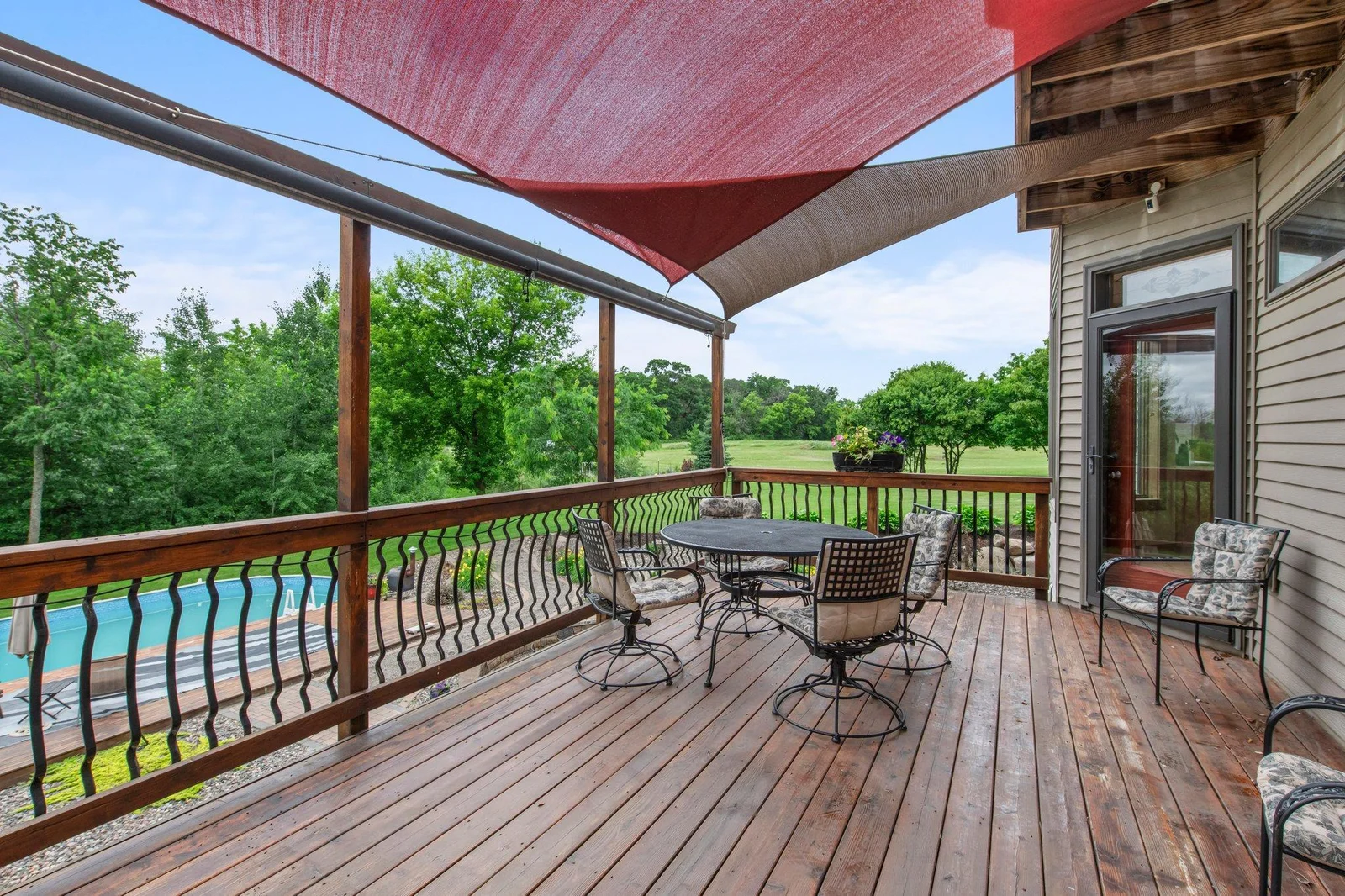 The deck offers plenty of space to enjoy the sun or head down to the pool.