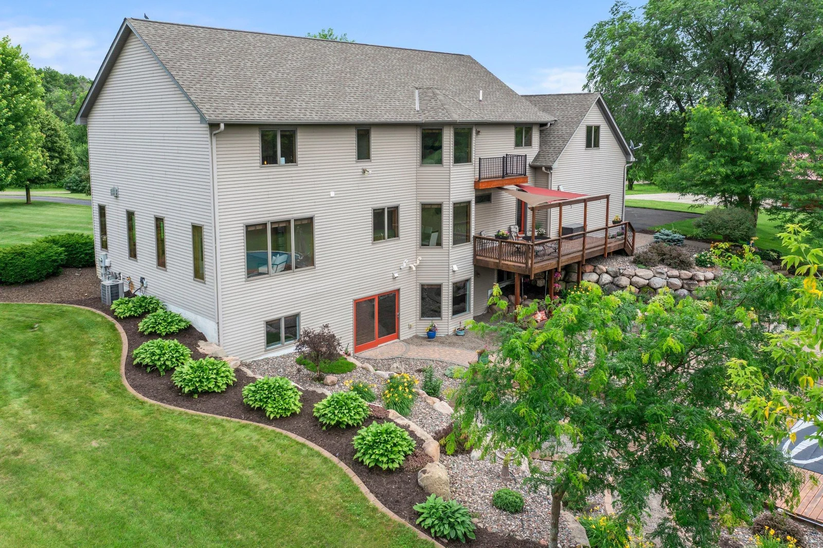 The backyard has been expertly landscaped to create the perfect outdoor space.