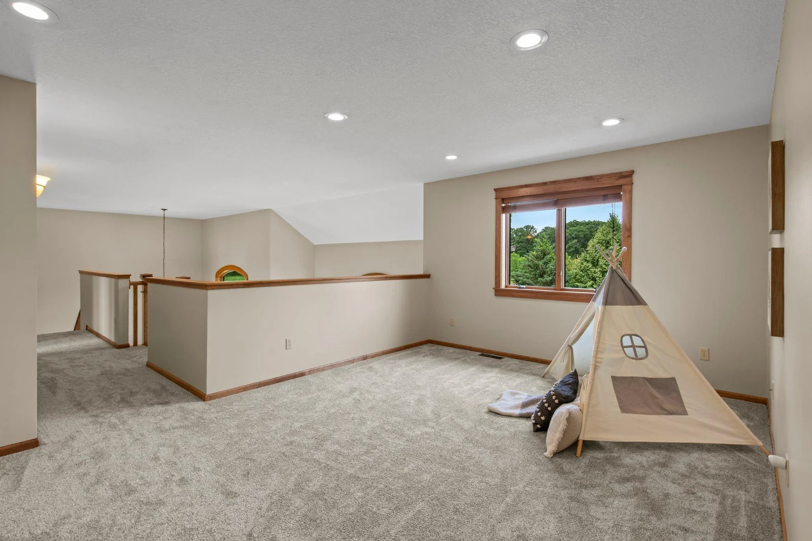 The loft area offers additional space in the upper level.
